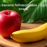 Fresh apple banana on wooden cutting board with tropical leaves